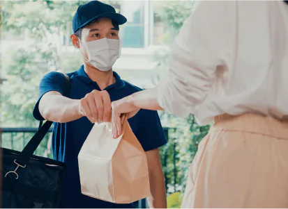 GreenShield pharmacy shipping delivery driver dropping of a client order