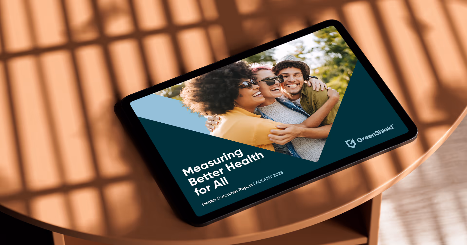 A mockup of GreenShield's health outcomes report displayed on a tablet computer