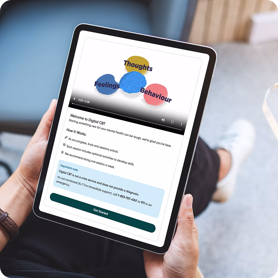 A person holding a tablet displaying the GreenShield+ dashboard, showcasing how a digital mental health support platform provides easy access cognitive behavioural therapy online.

