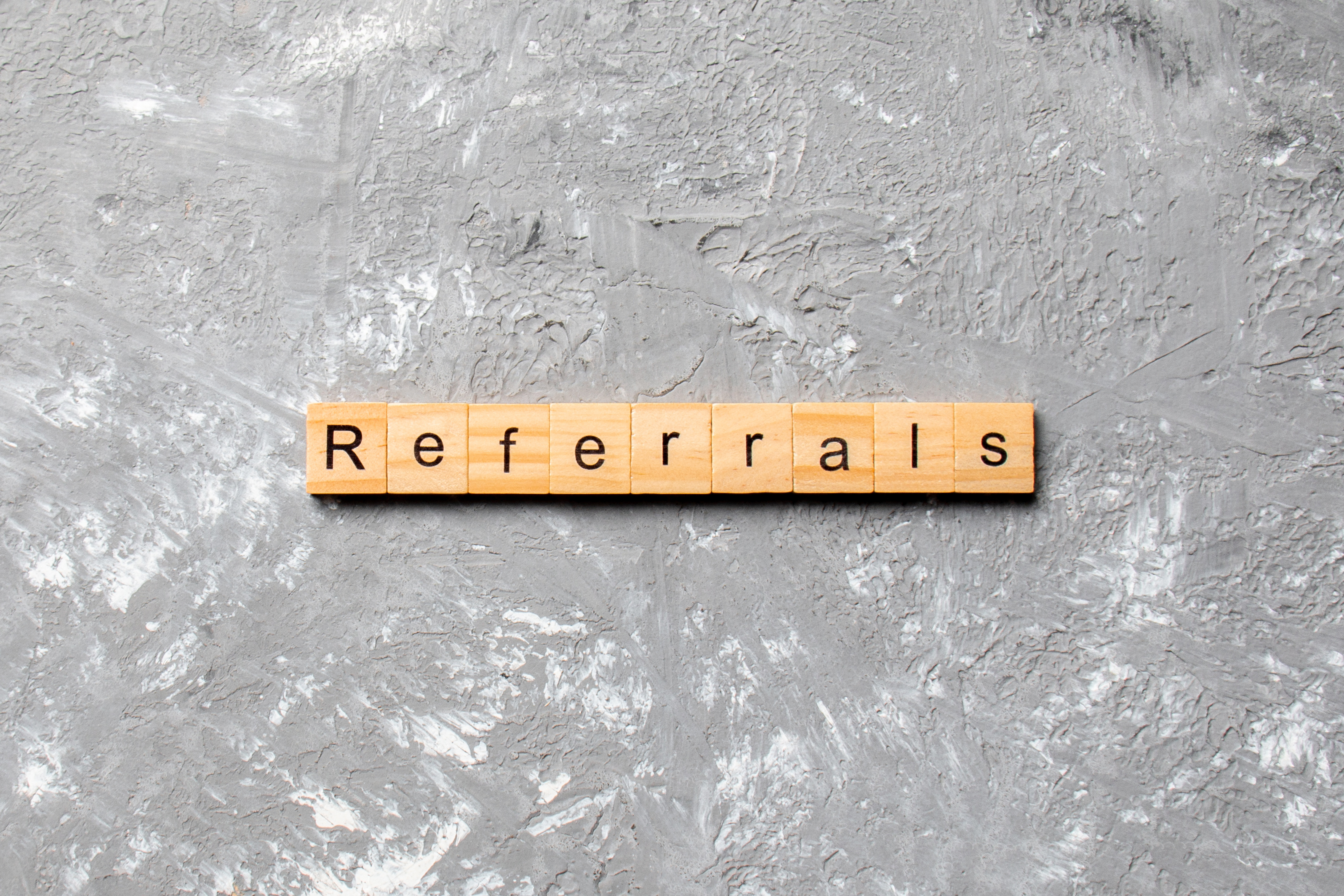 REFERRALS spelled on wooden blocks for word of mouth marketing, Alcoa TN