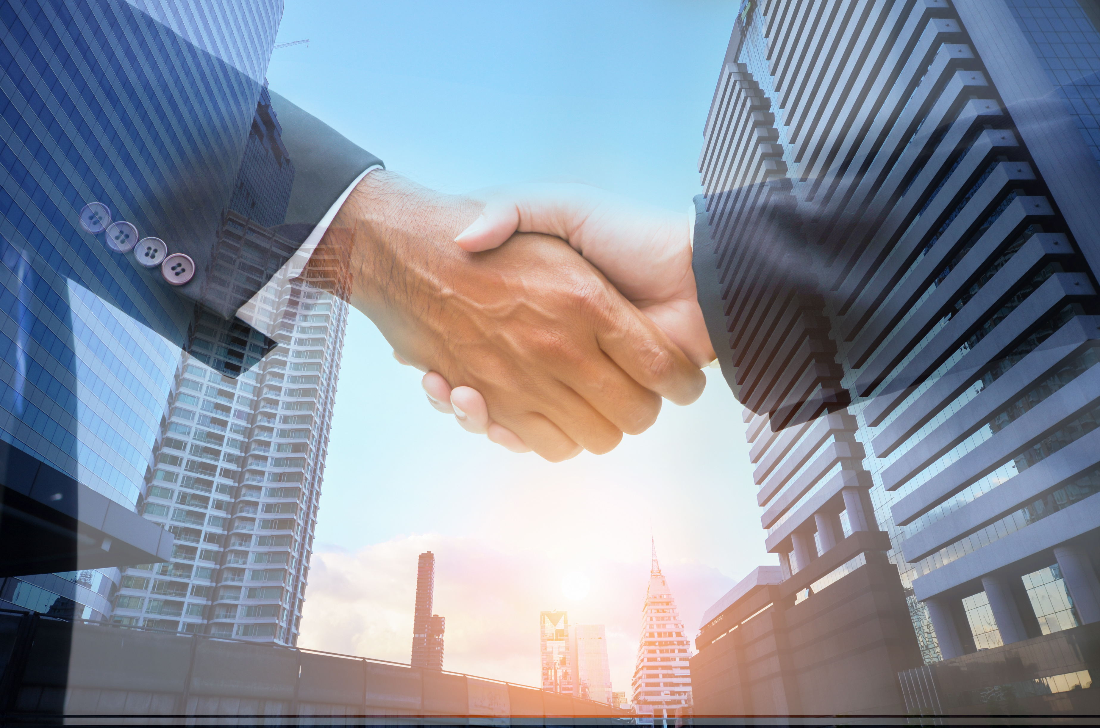 Business handshake sealing a deal in the city, Oak Ridge TN