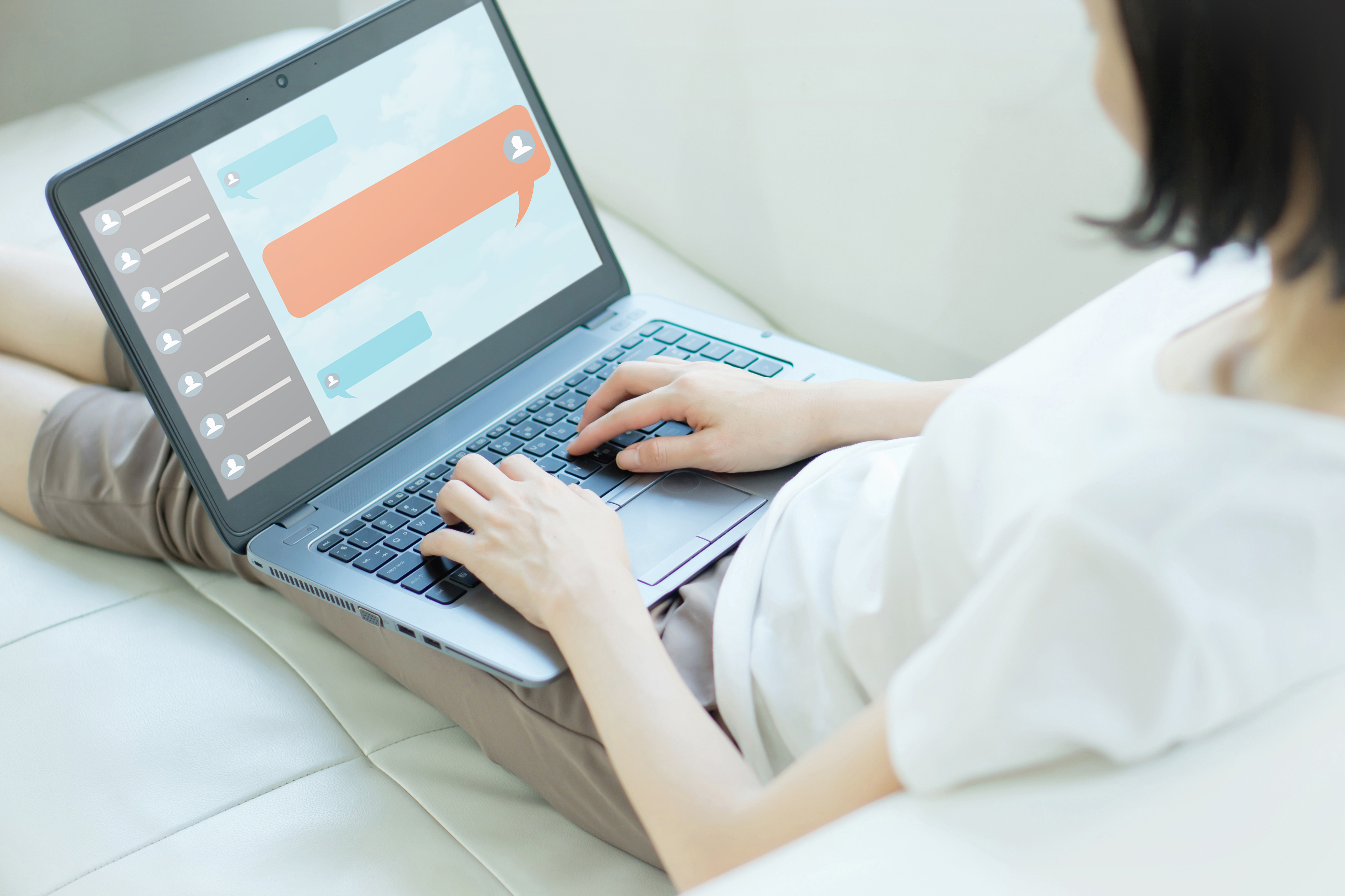 Person using AI writing assistant on a laptop, Knoxville TN