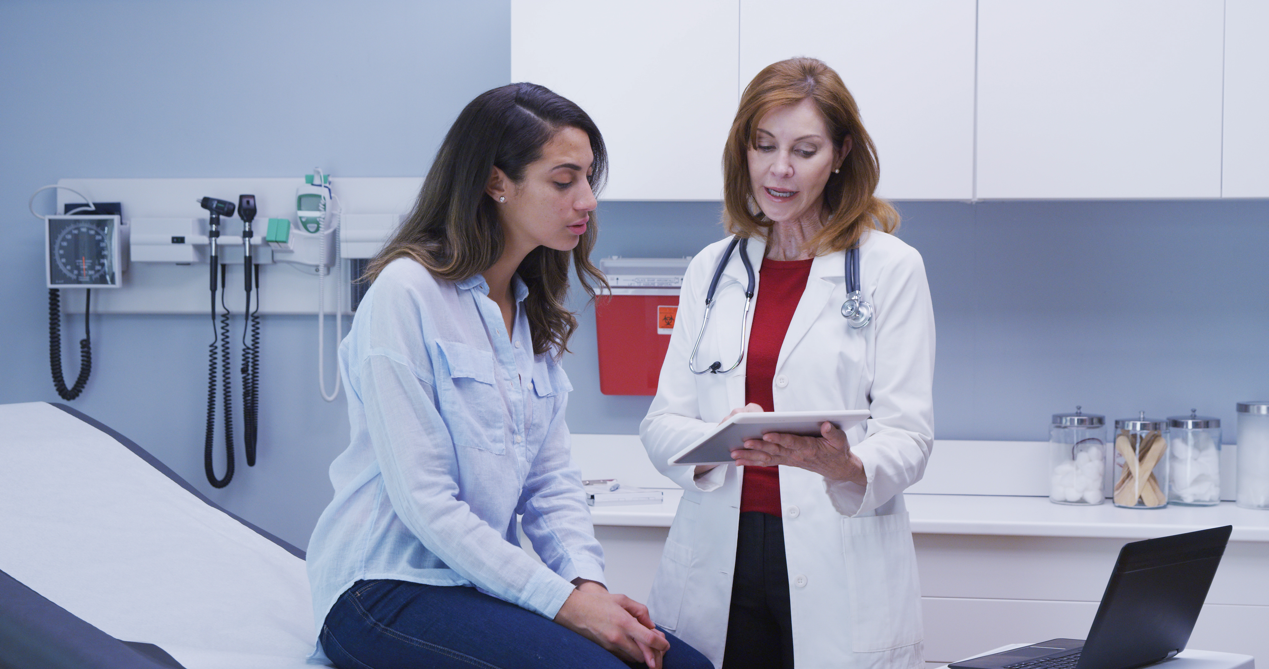 Doctor consulting with patient at medical practice, Knoxville TN