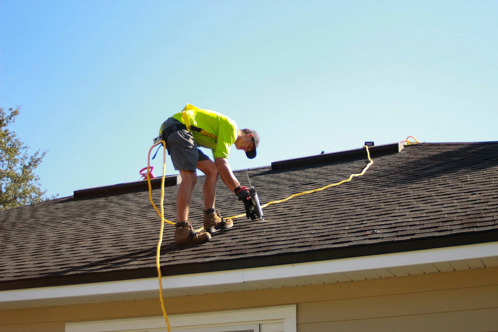 Roofer working on a residential roof in Knoxville