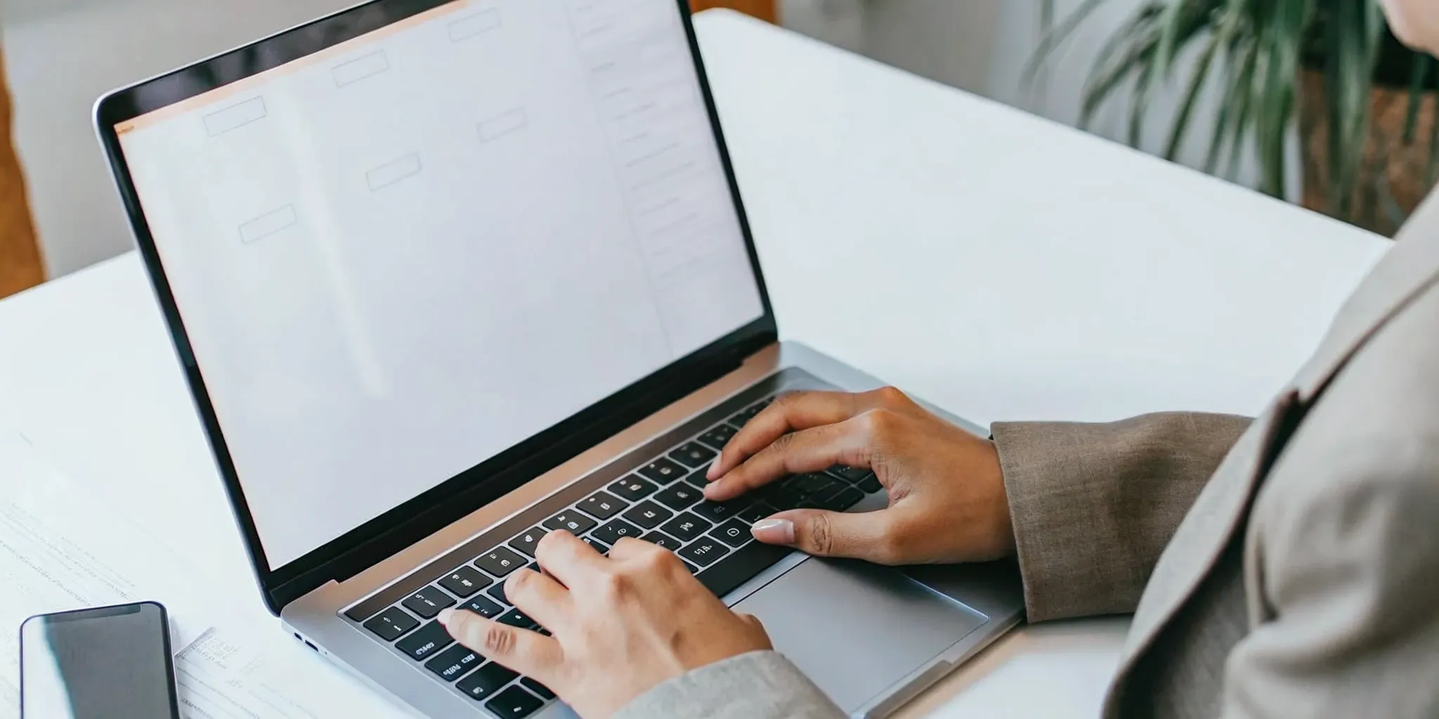 Person on a laptop searching how to get a loan today.