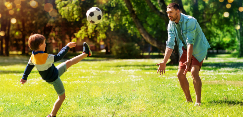 a soccer coach going through a play with his team
