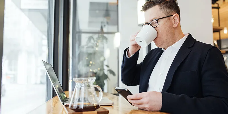 Business owner examining end of year financial opportunities.