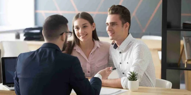 Two people curious about how to secure a business loan.