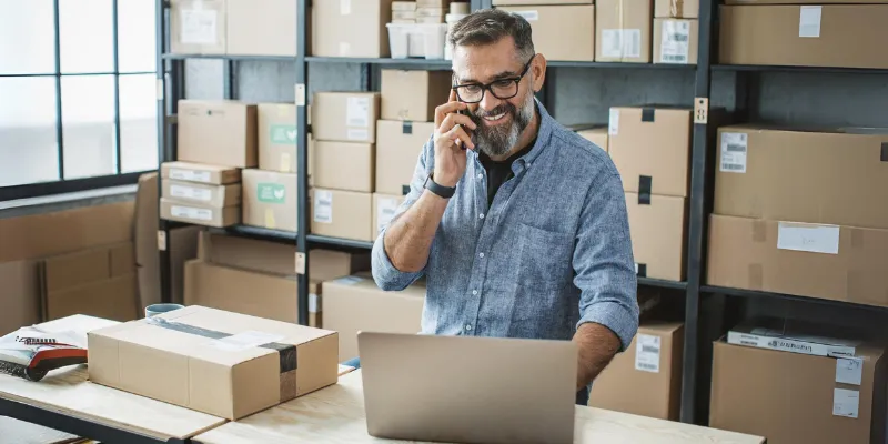 Small business owner reading about the 6 myths about small business loans