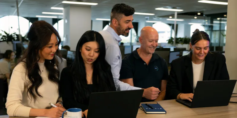 Bizcap employees exploring Bizcap's financing options with small business owners