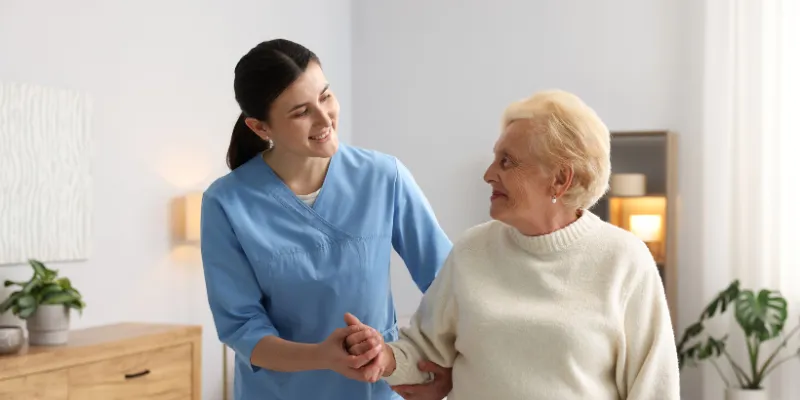 Social worker working with an older woman with disabilities