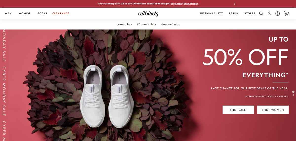 Allbirds website design featuring a minimalist layout with earthy tones, red accents for Cyber Monday sale, and bold typography. An image of eco-friendly shoes emphasizes the brand's sustainable values.