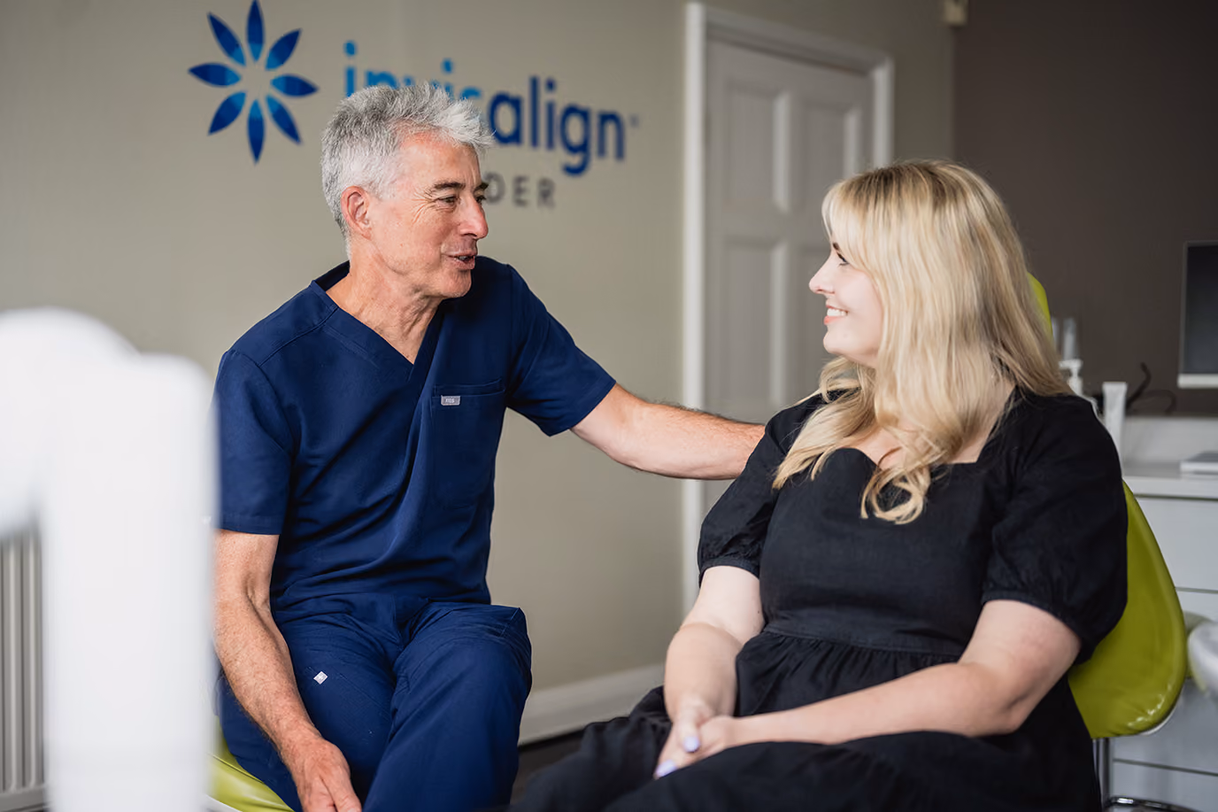 Dentist Ed and female patient chatting