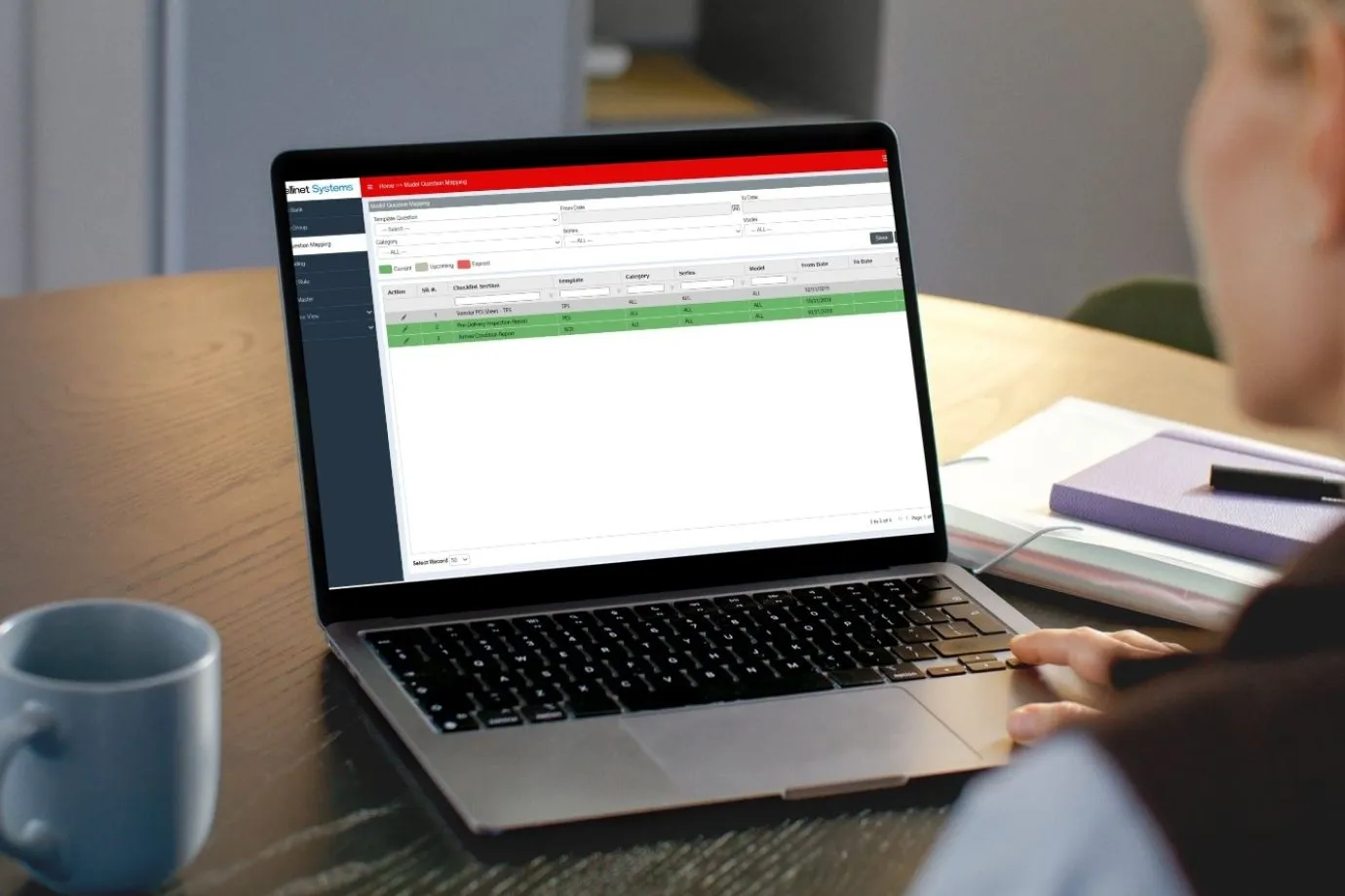 User interacting with the Intelli PDI, which simplifies and digitizes pre-delivery inspection processes