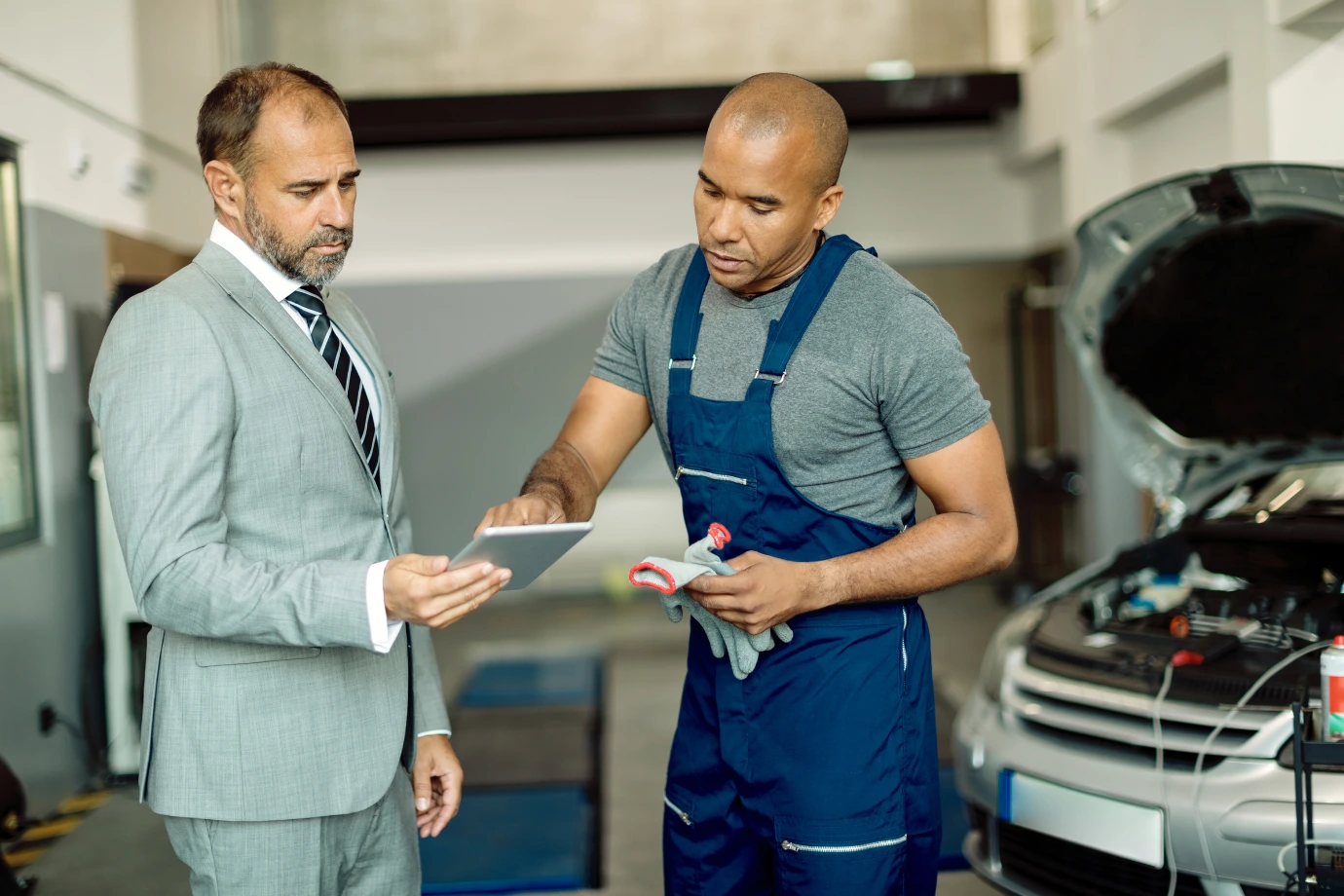 Team collaborating to establish a comprehensive warranty playbook