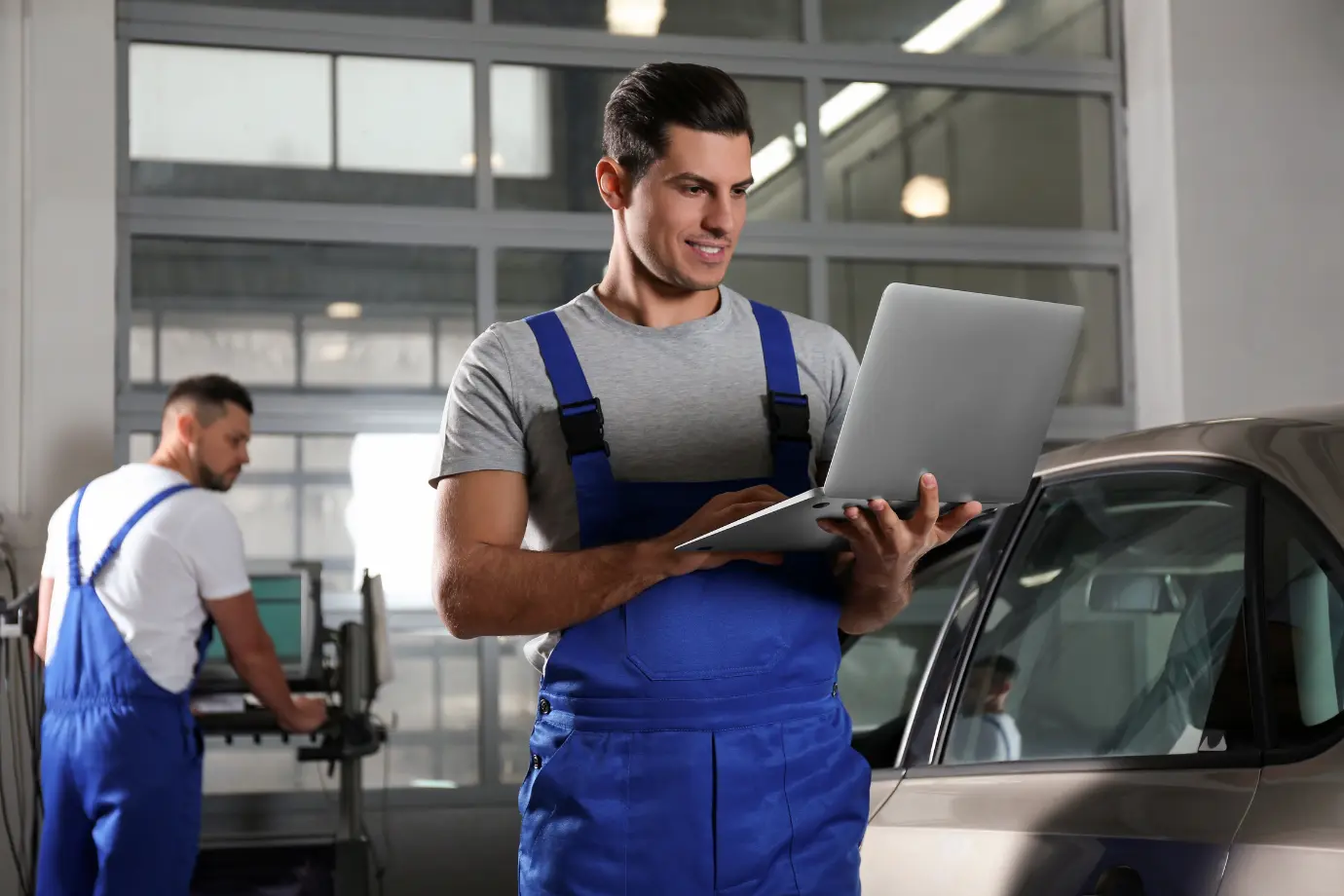 Mechanic using Intelli Catalog to efficiently manage automotive spare parts