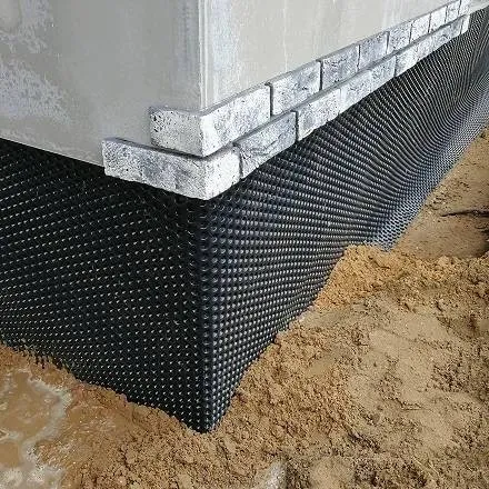 Basement waterproofing around the exterior of a building.