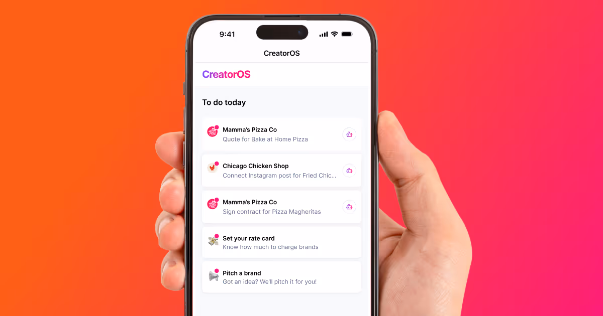 Creator holding contract in front of her face
