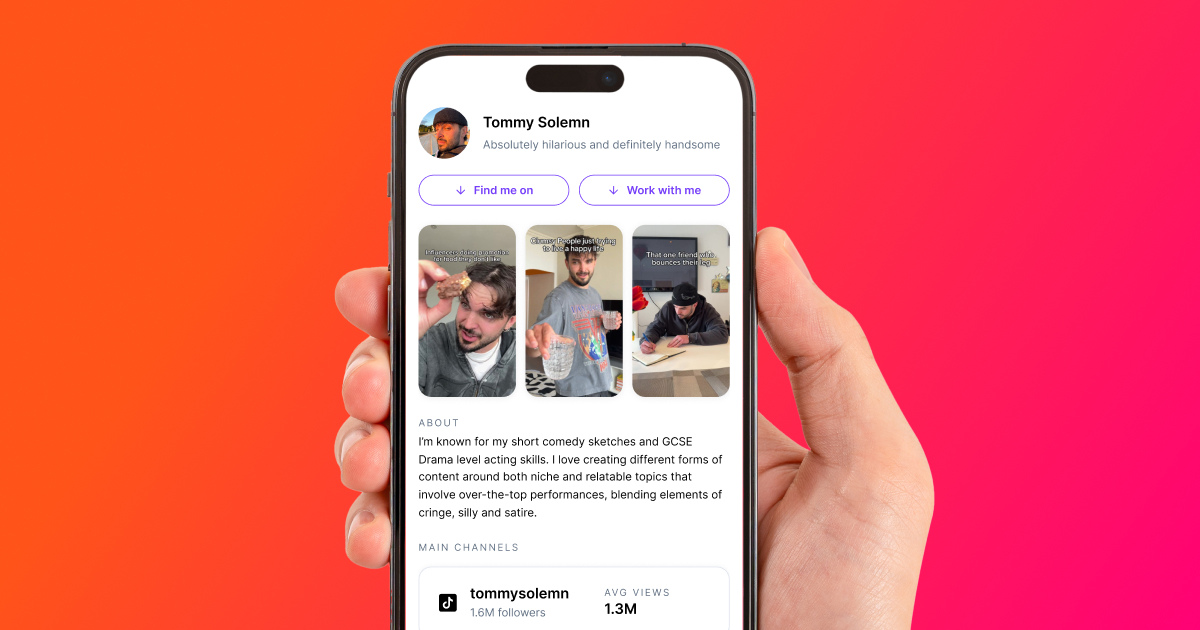 Creator holding phone with link-in-bio page