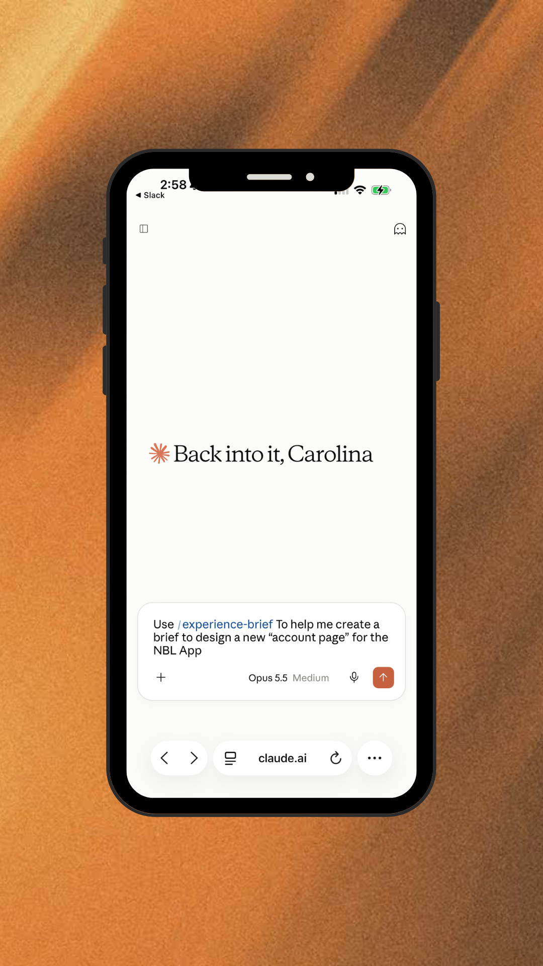 Mobile phone screen showing the text 'Back into it, Carolina' and a chat input with the prompt 'Use /experience-brief To help me create a brief to design a new "account page" for the NBL App.' The screen has navigation controls at the bottom with claude.ai URL.
