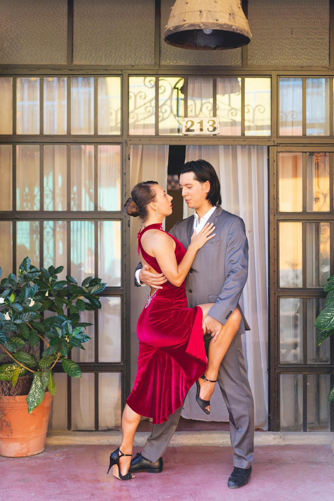 couple strikes a dramatic pose while dancing