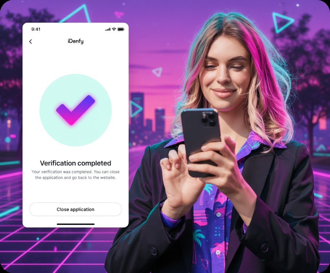 Smiling woman with colorful hair using a smartphone with verification completed screen visible.