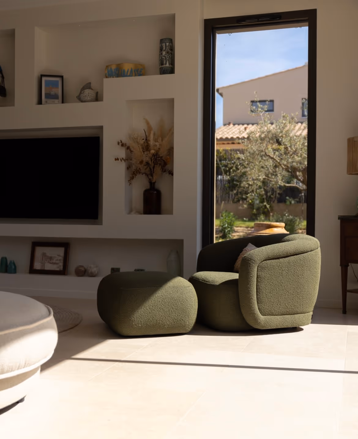 Designer interior detail with reed diffuser and soft light in Saint-Tropez office