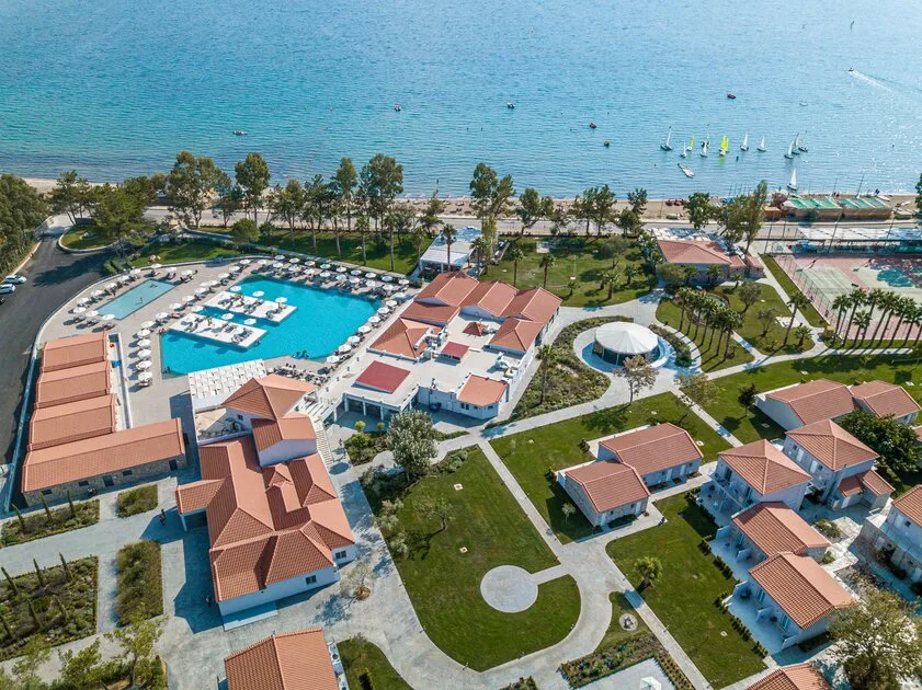 Aerial view of Mark Warner Paleros Beach Resort with pools by the sea