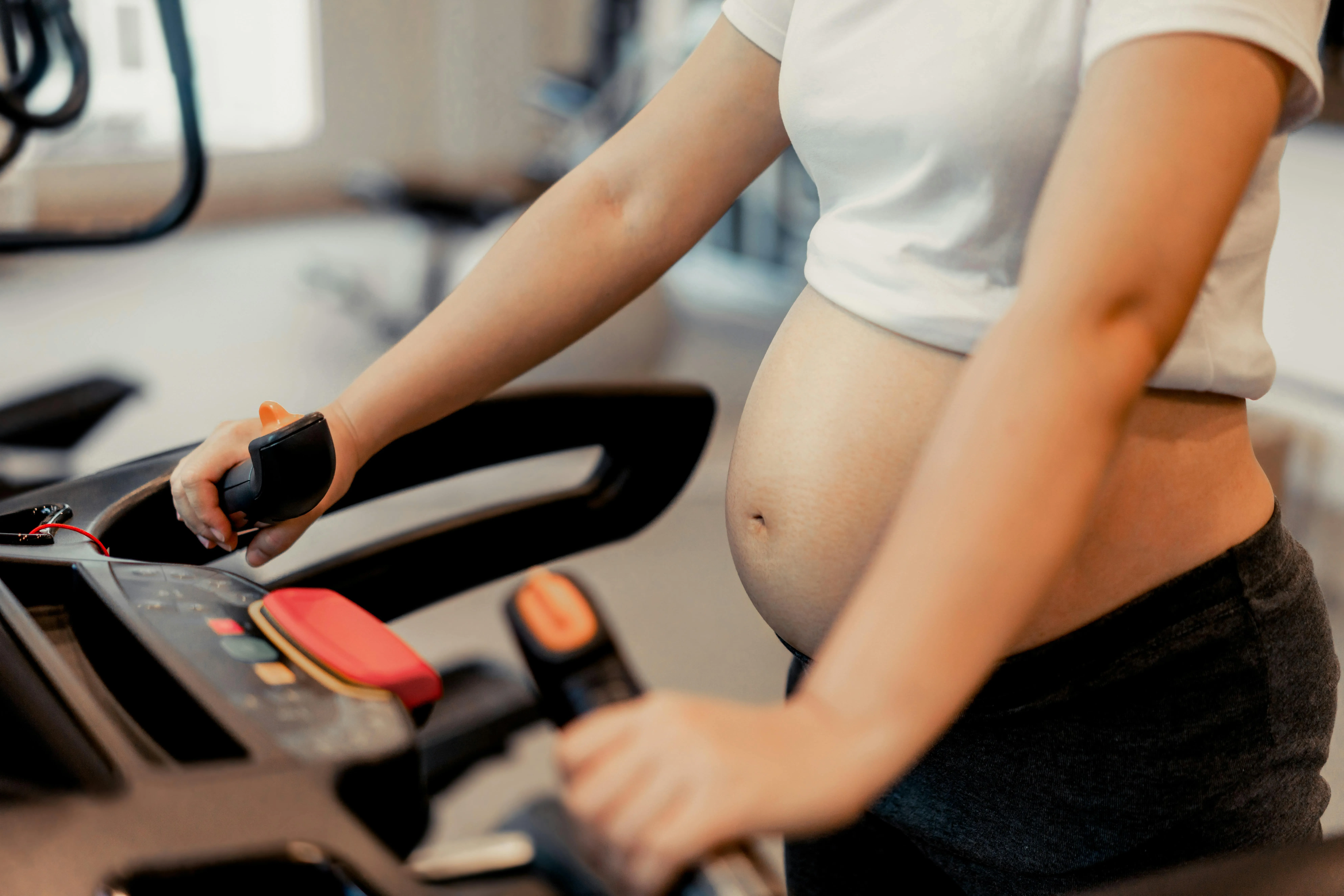 What are the different points to consider when exercising at each trimester? 