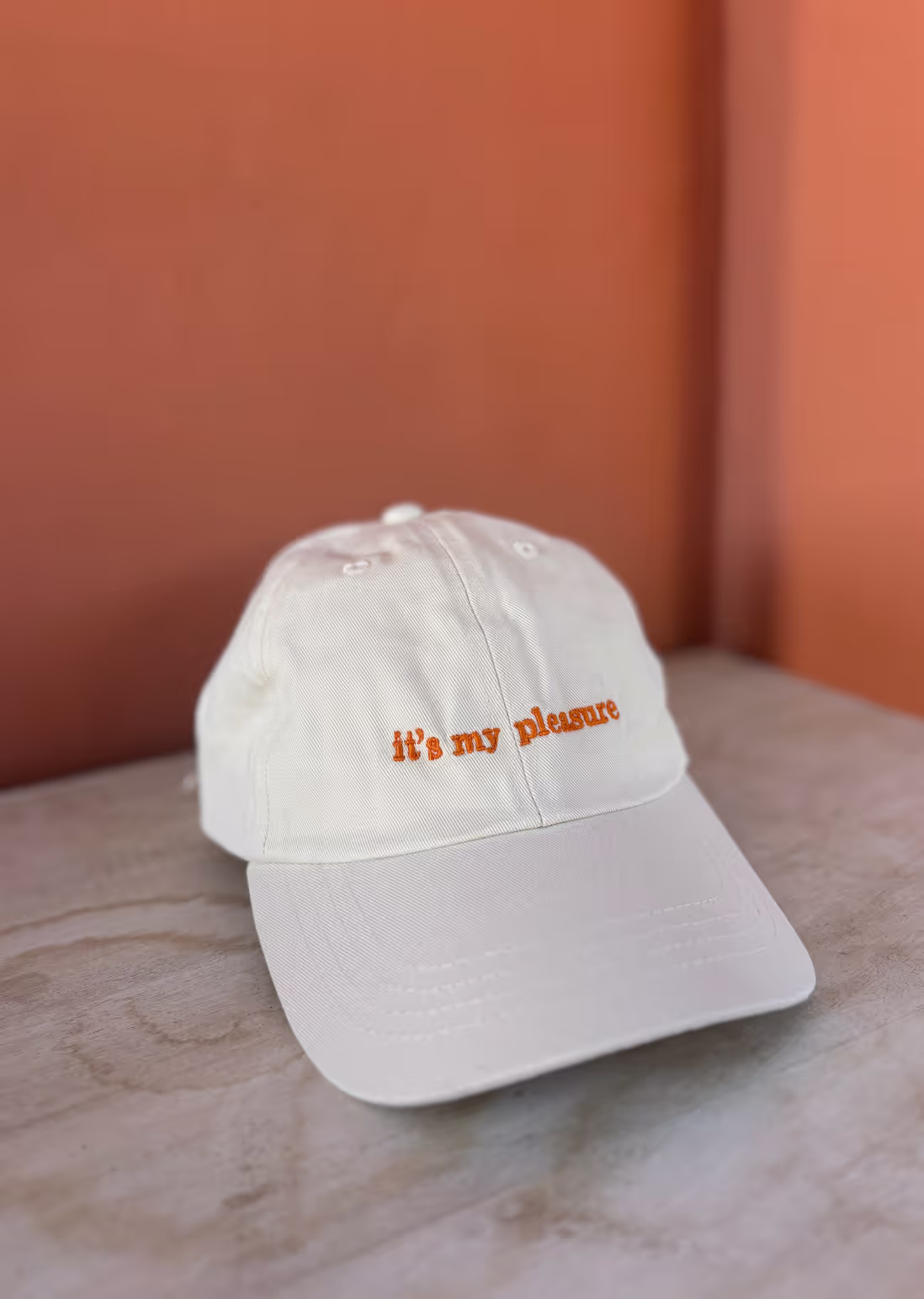 heyyoli it’s my pleasure cap in beige front