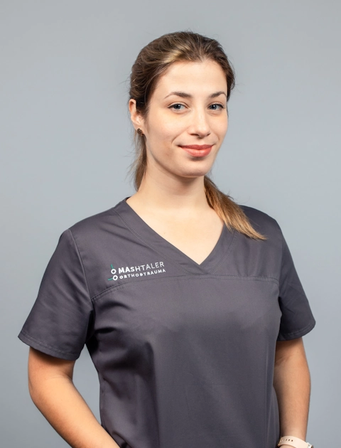 The photo shows Natalia Sych — doctor of physical and rehabilitation medicine at Mashtaler Ortho&Trauma Medical Center