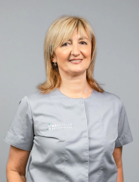 The photo shows Natalia Mashtaler — doctor of physical and rehabilitation medicine at Mashtaler Ortho&Trauma Medical Center