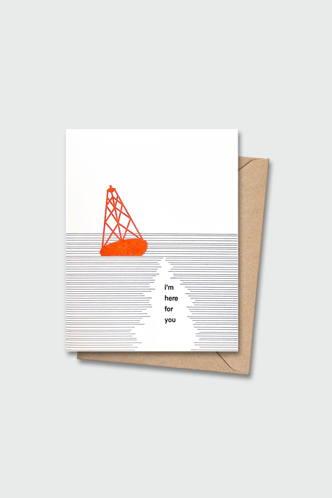 Letterpressed greeting card with red buoy in water next to the words "i'm here for you" on white card and taupe envelope