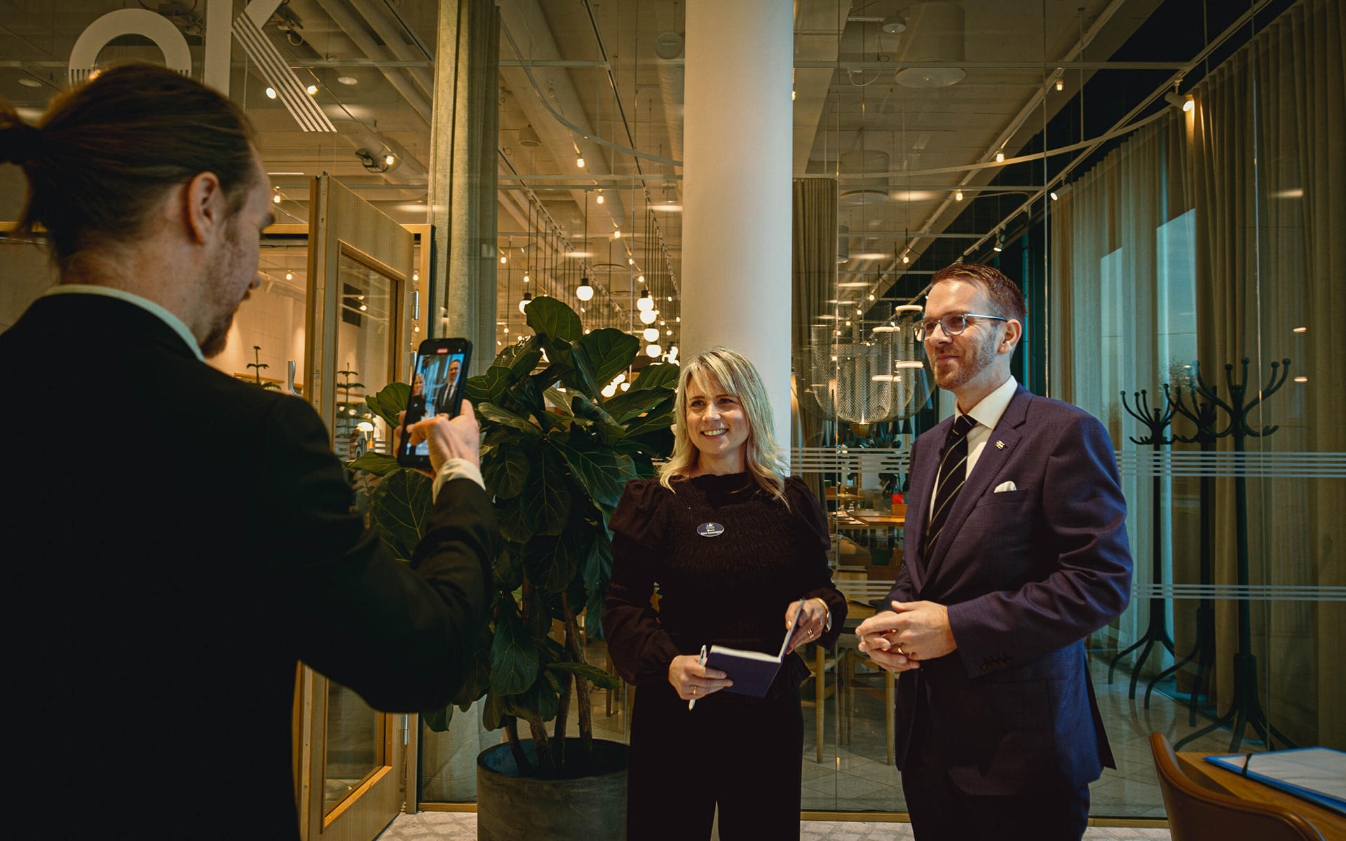 Minister for Infrastructure Andreas Carlson being interviewed on camera