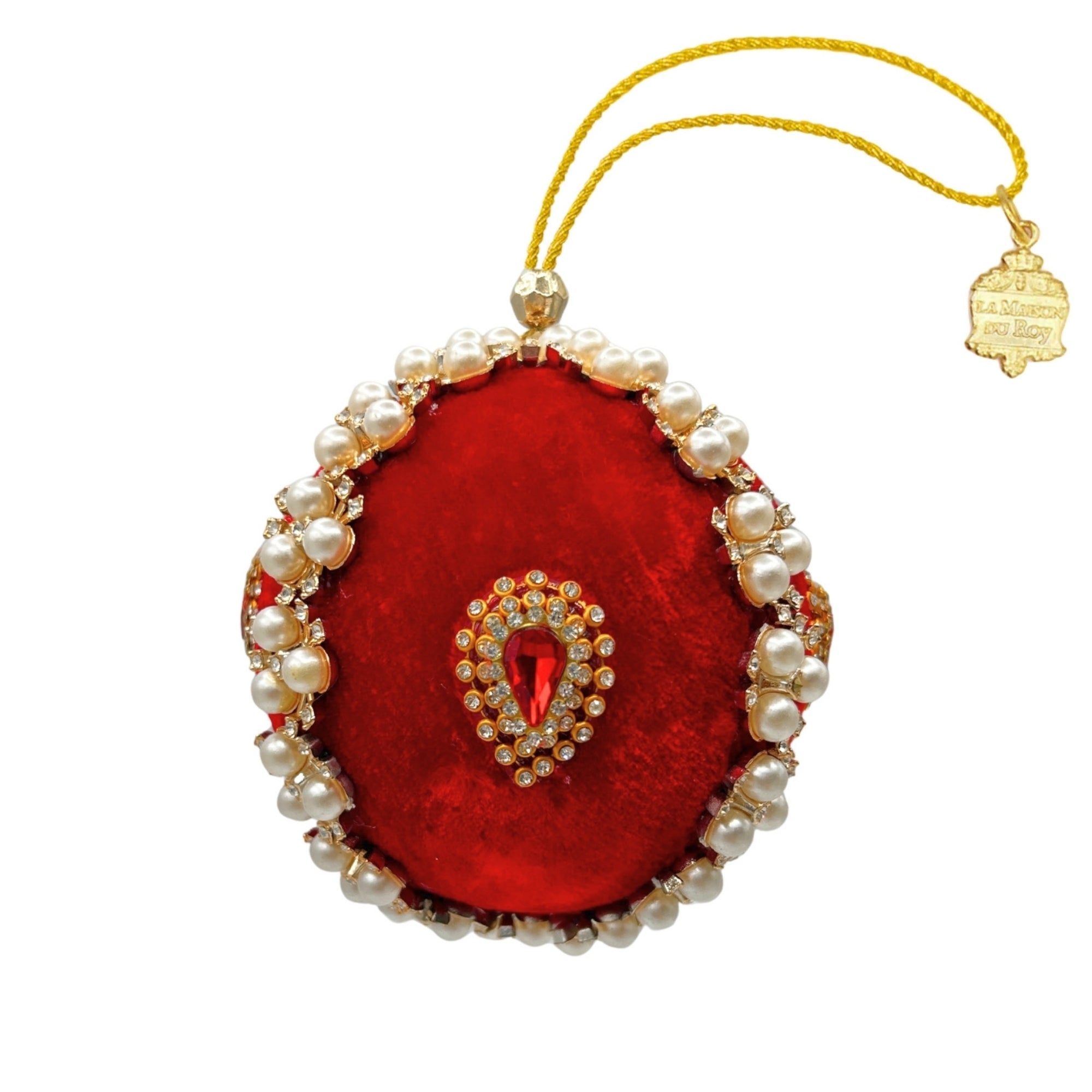 Boule de Noël en velours rouge bordée de perles nacrées et cabochon central en strass