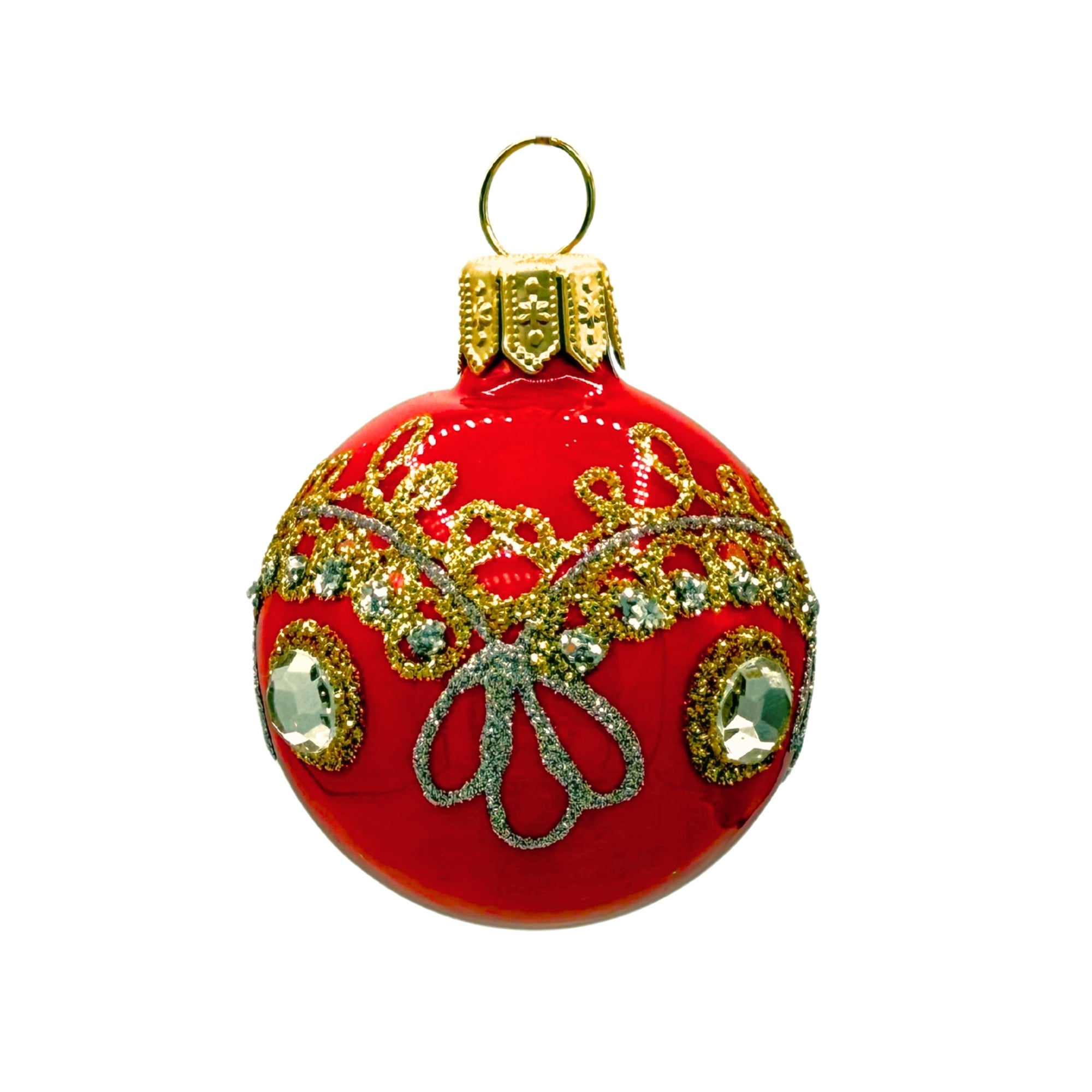 Petite boule en verre rouge avec motifs dorés en relief, éléments facettés et anneau métallique pour suspension