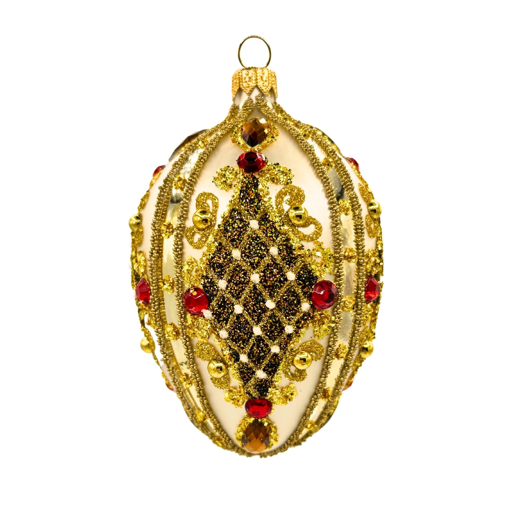 Oeuf de Noël en verre soufflé blanc orné de motifs dorés, noirs et pierres rouges