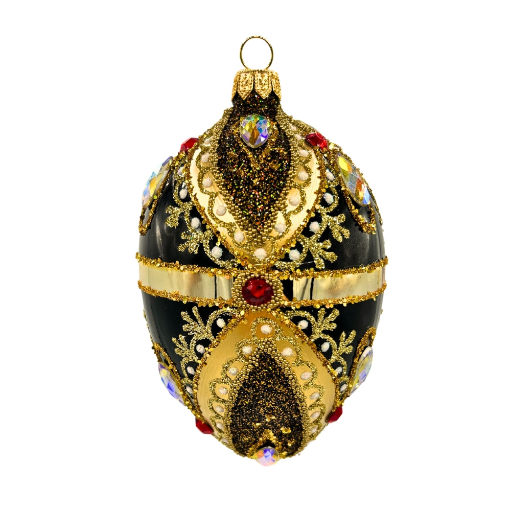 Oeuf de Noël en verre noir décoré de motifs dorés, perles et strass rouges