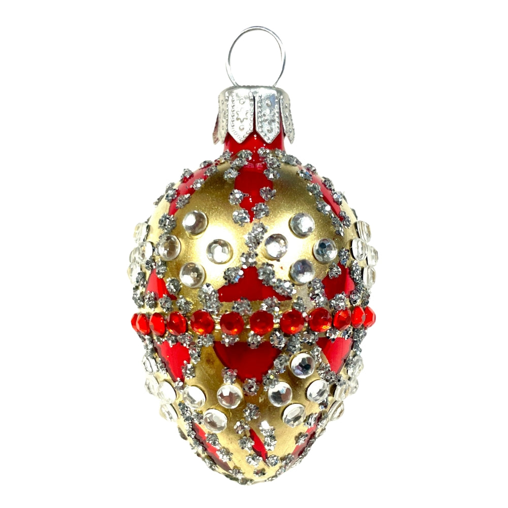 Petit oeuf en verre soufflé rouge et or, décoré de strass argentés et rouges