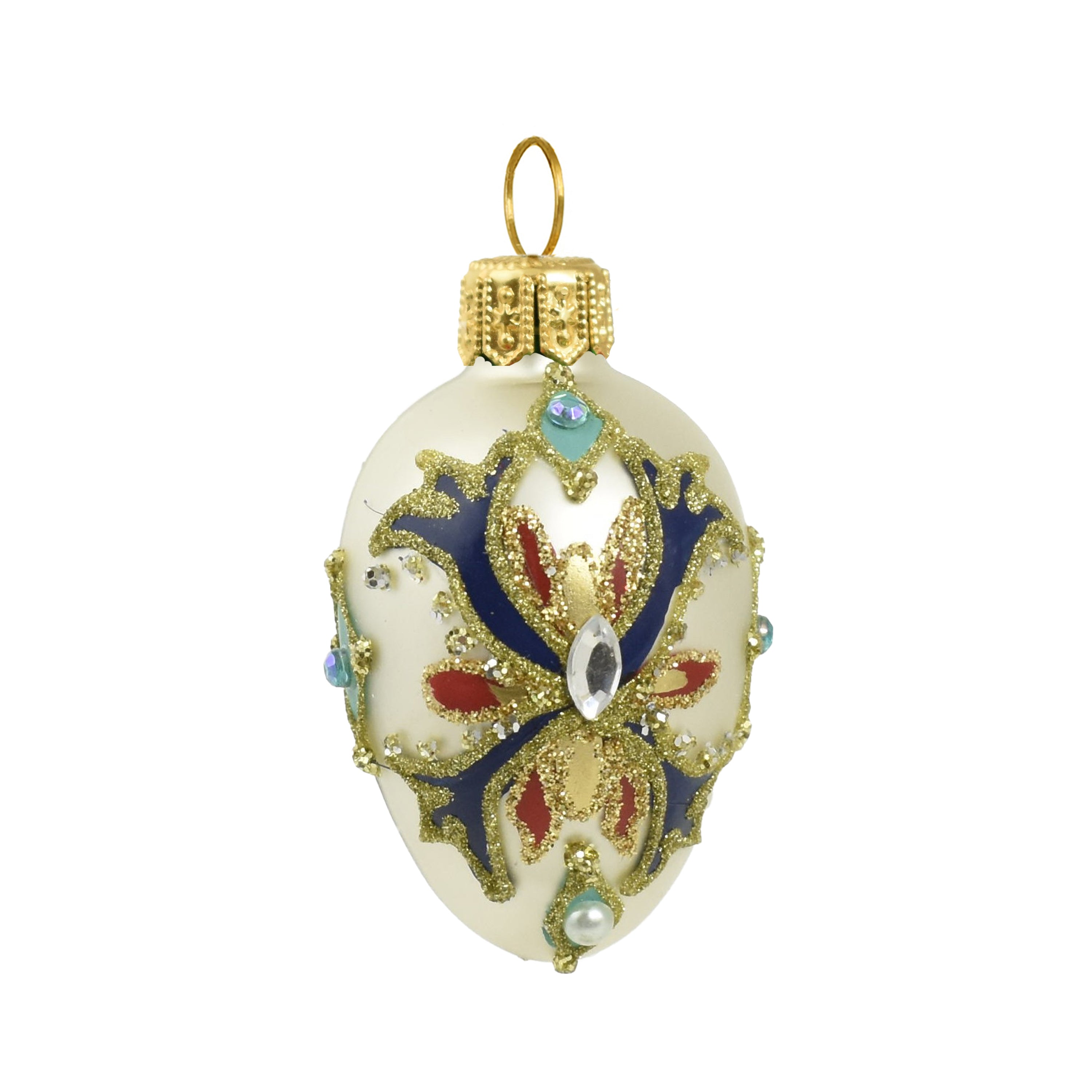 Petit oeuf en verre soufflé blanc décoré d'or, bleu et rouge avec cabochon central