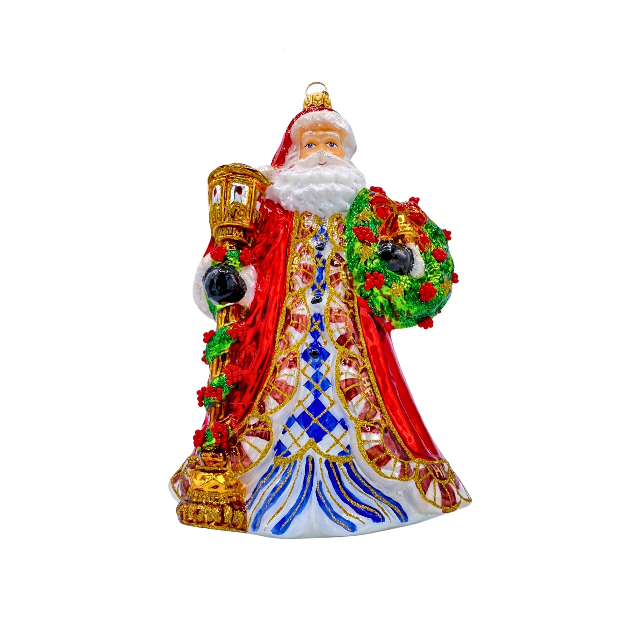 Père Noël en verre soufflé tenant une lanterne dorée et une couronne verte