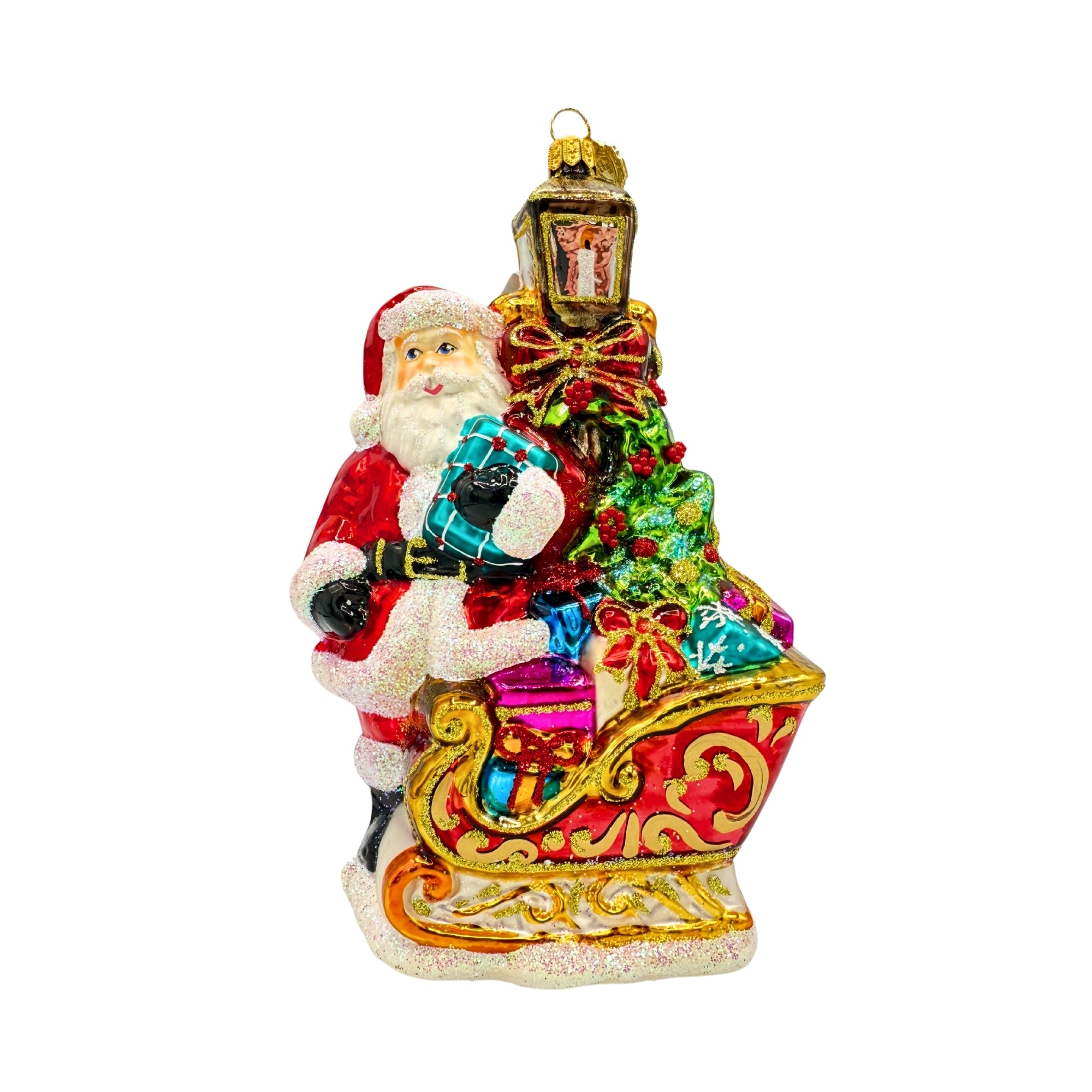Père Noël en verre soufflé tenant un cadeau, assis dans un traîneau rouge et doré