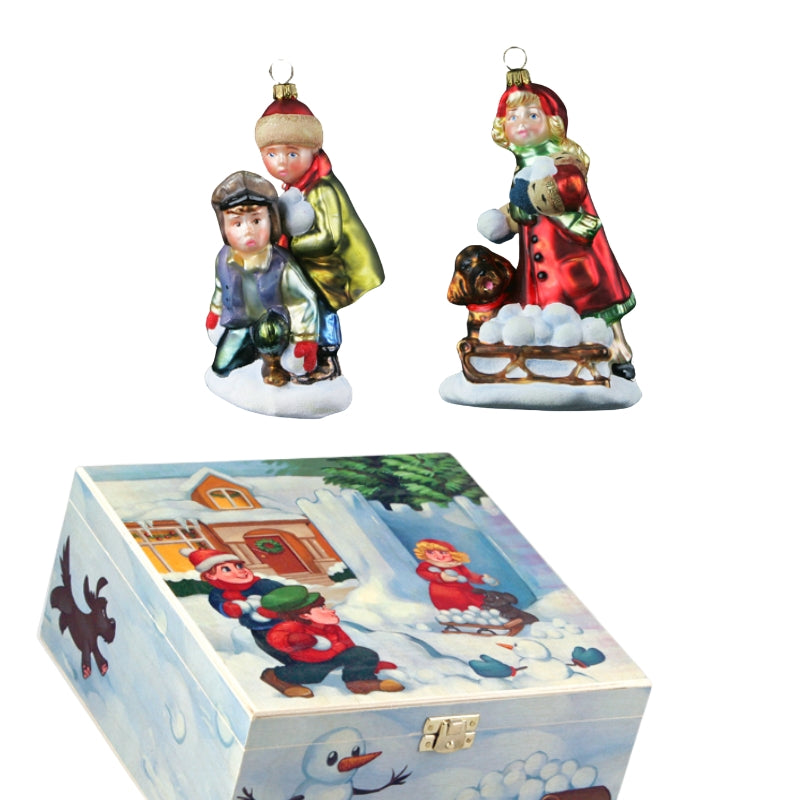 Deux sujets d'enfants en verre soufflé, garçon et fillette de Noël avec coffret illustré
