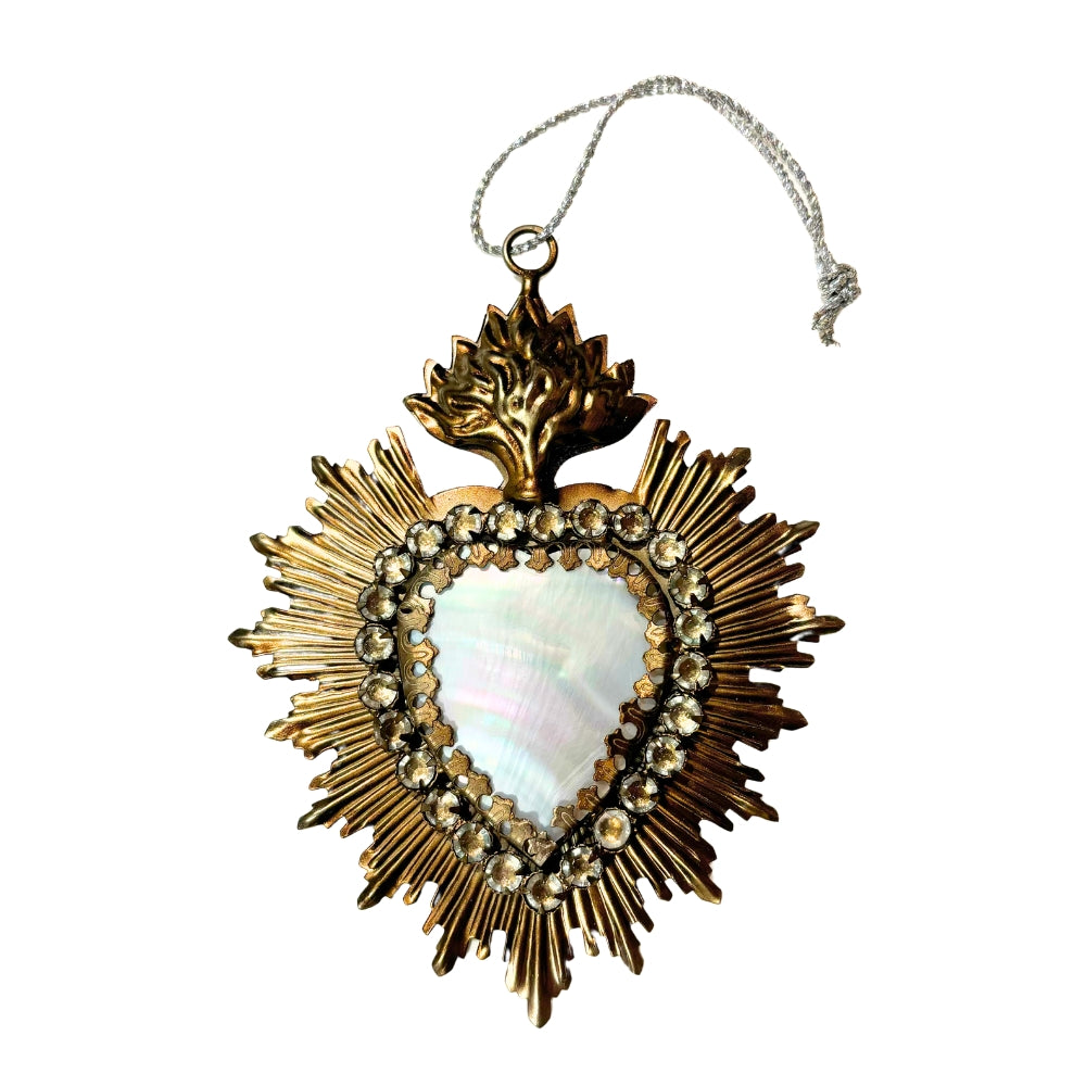 Ex-voto cœur en nacre irisée serti de strass, avec rayons dorés et cordon argenté