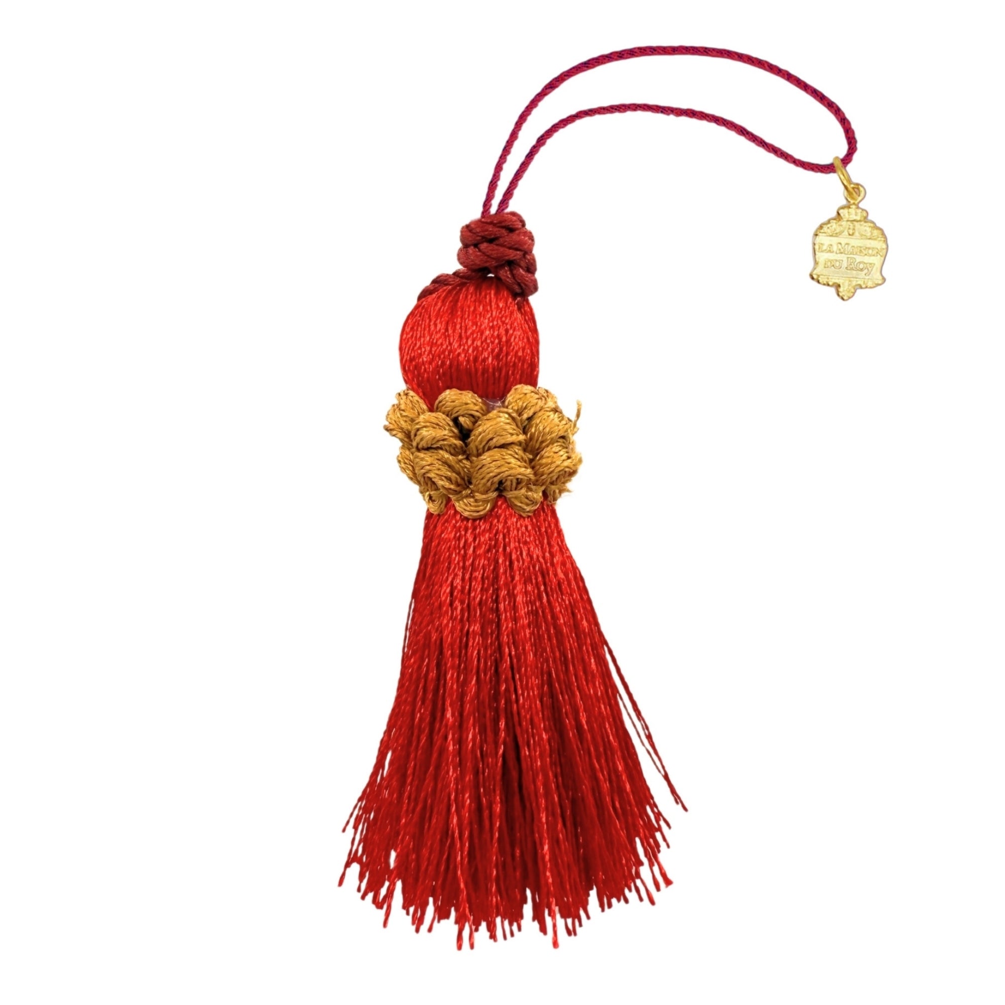 Pompon décoratif rouge en fils de coton avec anneau tressé doré