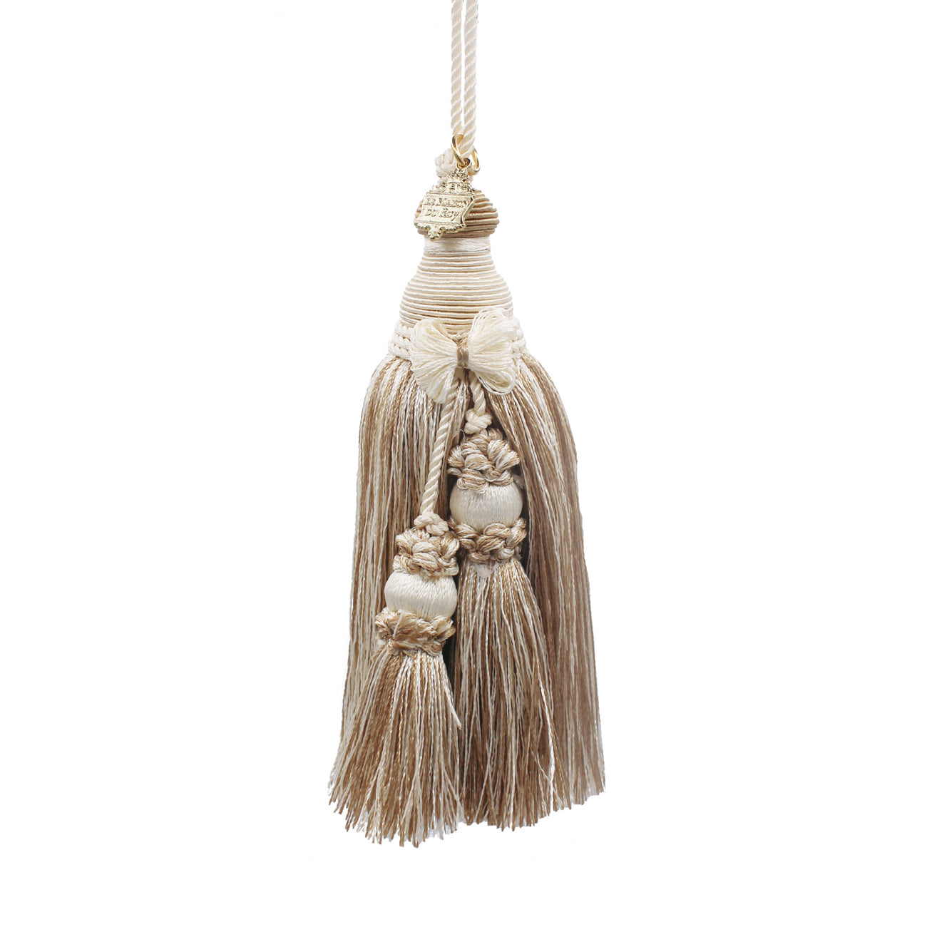 Pompon décoratif en coton blanc et beige avec nœud, deux pompons et écusson doré