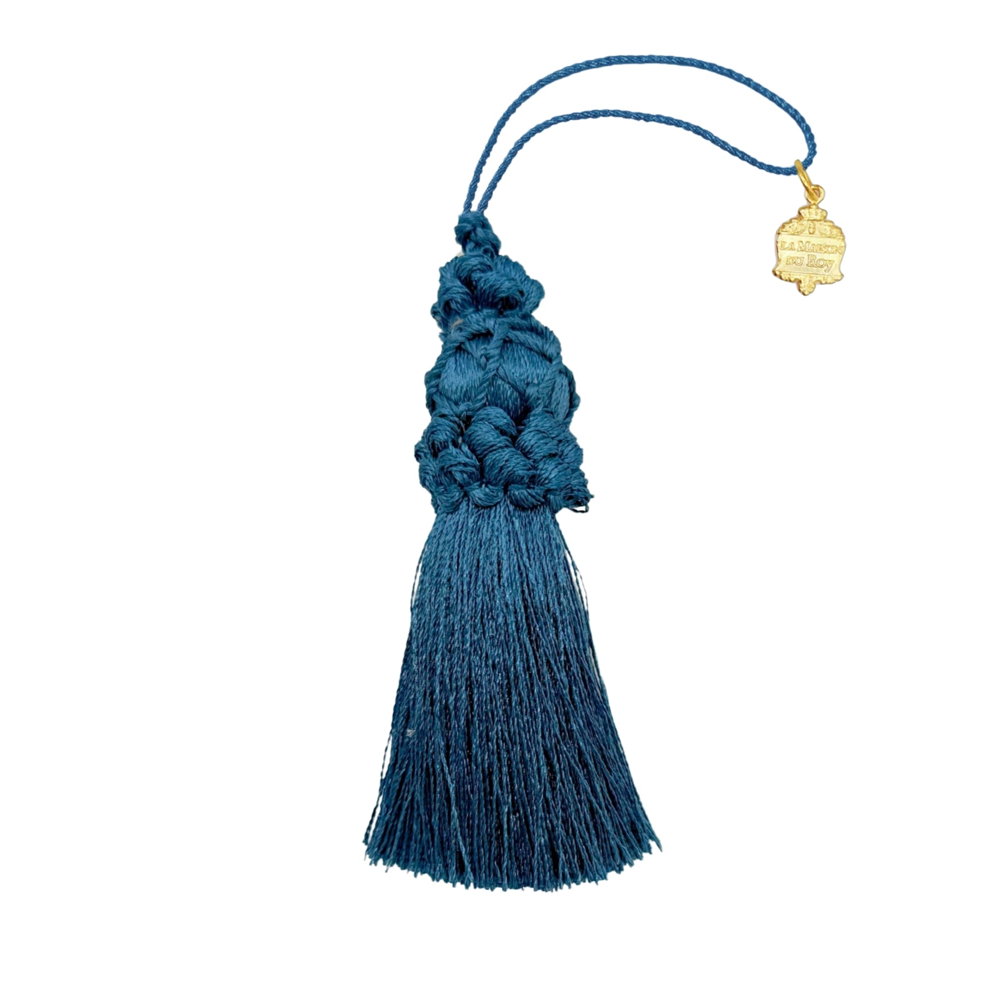 Pompon décoratif bleu en cordon tressé avec franges fines et médaillon doré