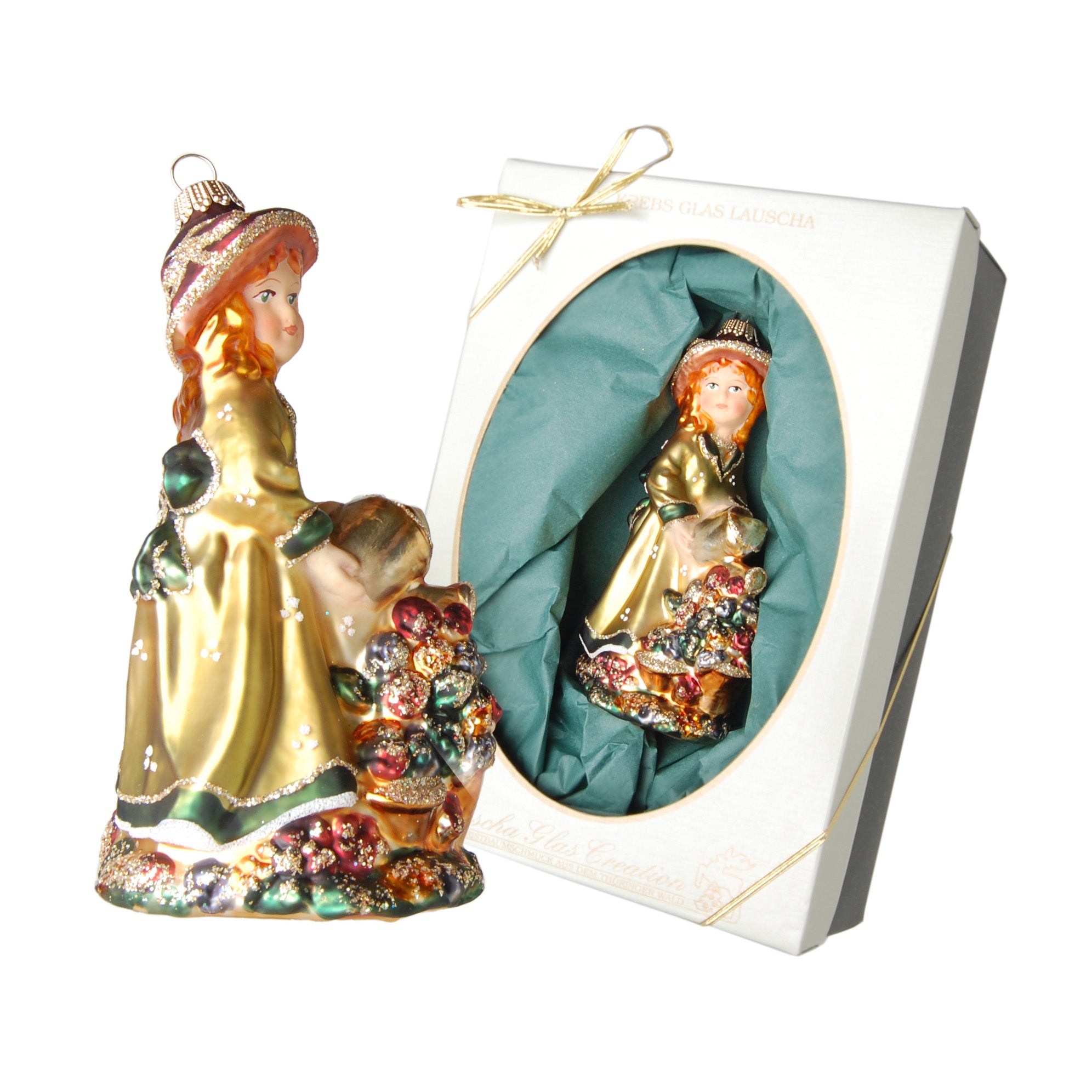 Figurine en verre soufflé Annabell sur fleur dorée avec robe verte et coffret cadeau