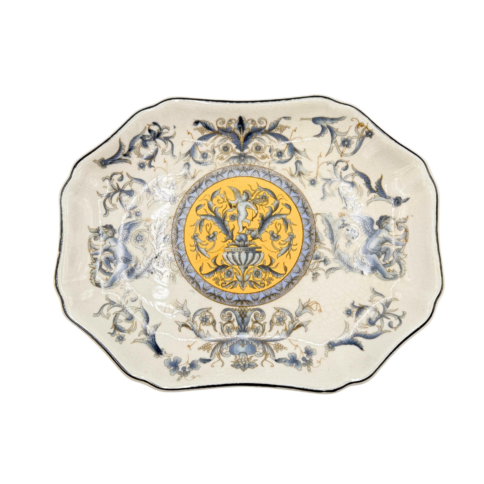 Assiette de présentation en céramique Bleu Versailles, forme octogonale, décor floral bleu et médaillon central doré à ang...
