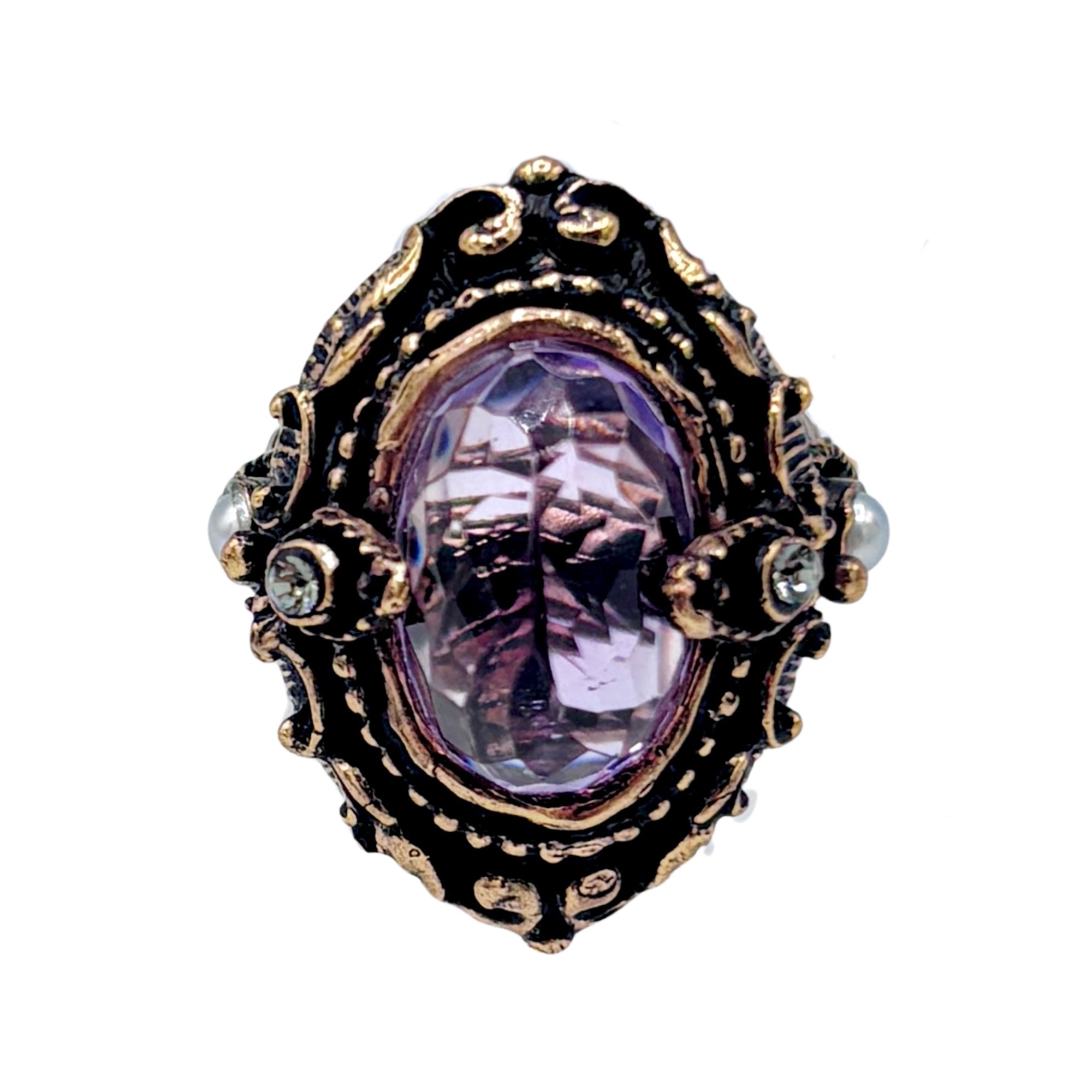 Bague création unique avec grande améthyste ovale facettée, monture ornée dorée et détails ajourés vintage